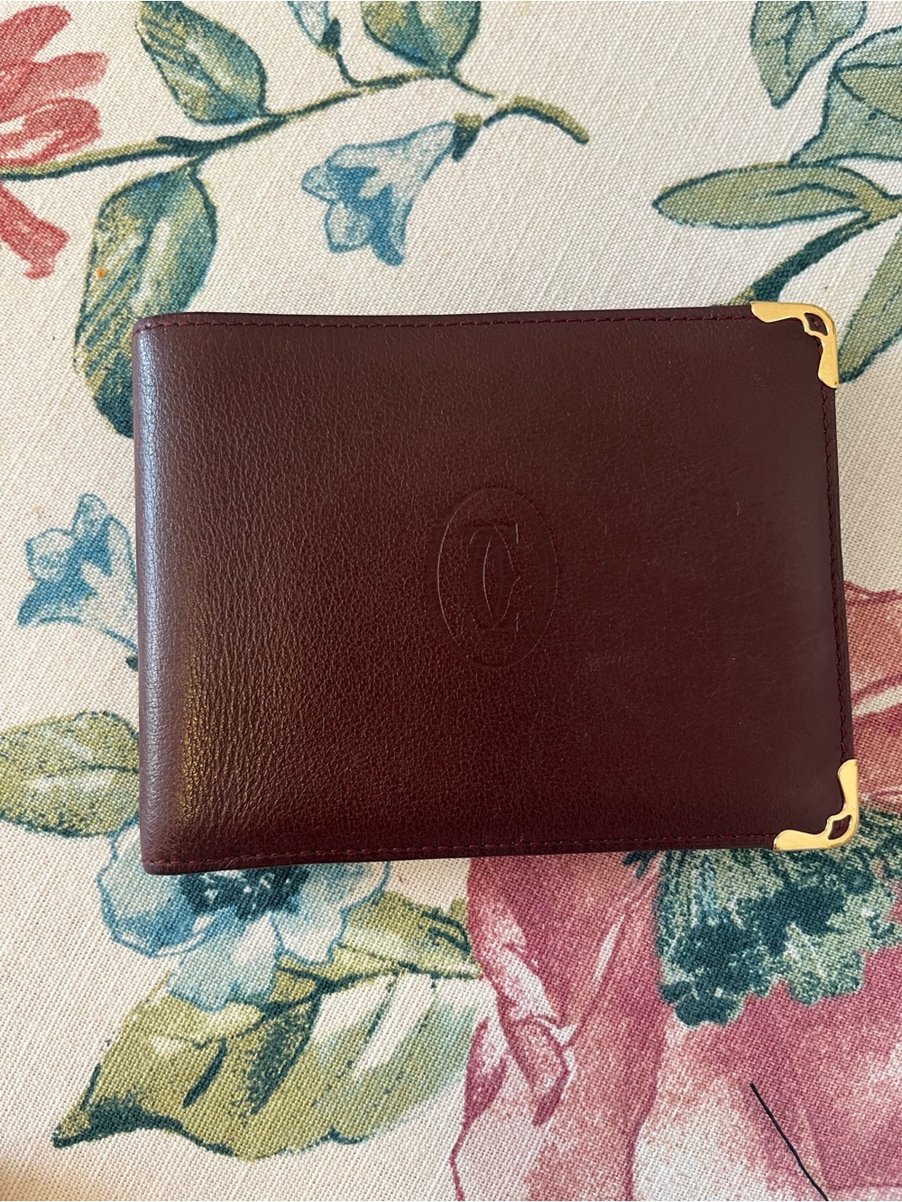 Cartier Men's Burgundy Leather Bifold Wallet with Gold Corners